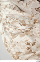  Photos Army Man in Camouflage uniform 13 21th century Army Desert uniform jacket upper body 0011.jpg